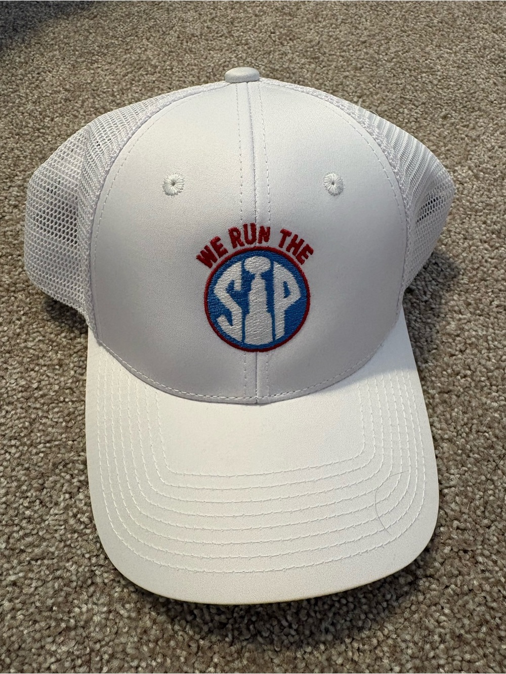 Ole Miss "We Run The SIP" Mesh Trucker Hat